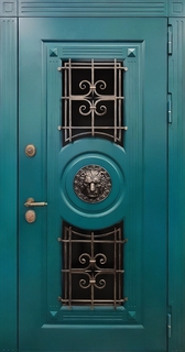 Входная коттеджная термодверь с зелеными панелями МДФ RAL и чеканкой «лев» (ковка + остекление) Входная коттеджная термодверь с зелеными панелями МДФ RAL и чеканкой «лев» (ковка + остекление)